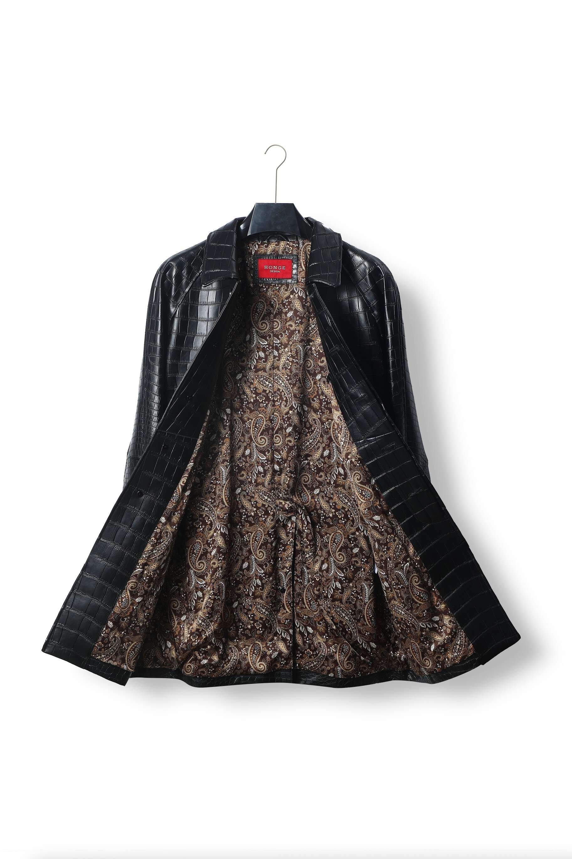 black crocodile-embossed leather coat or trench coat.