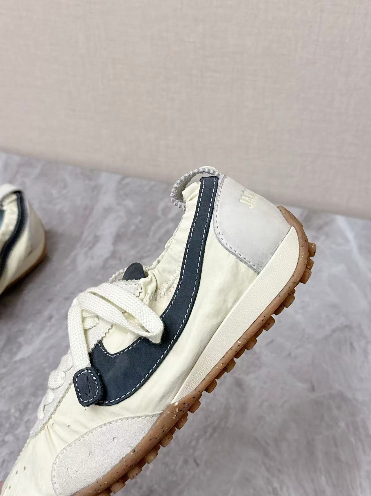 Nike x Jacquemus Moon Shoe SP in the Pale Yellow or Alabaster colorway