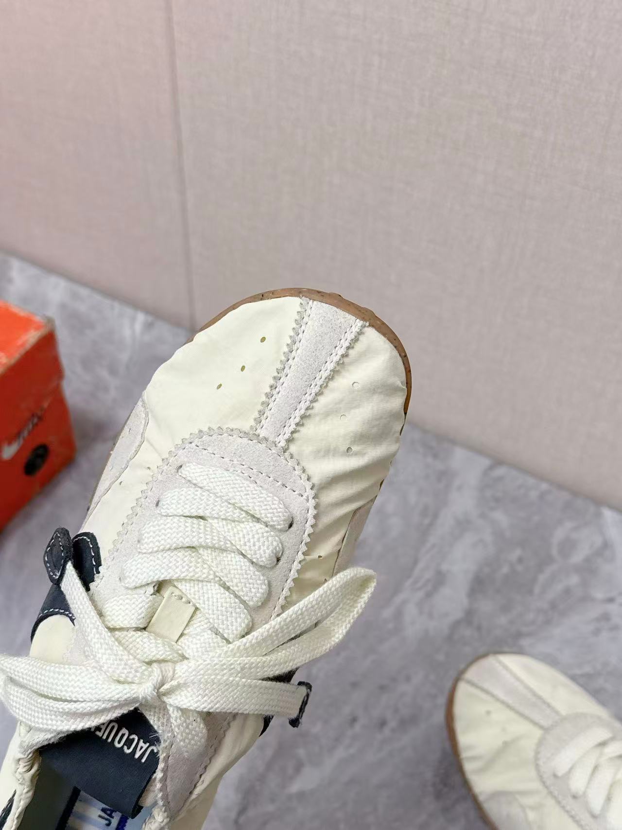 Nike x Jacquemus Moon Shoe SP in the Pale Yellow or Alabaster colorway