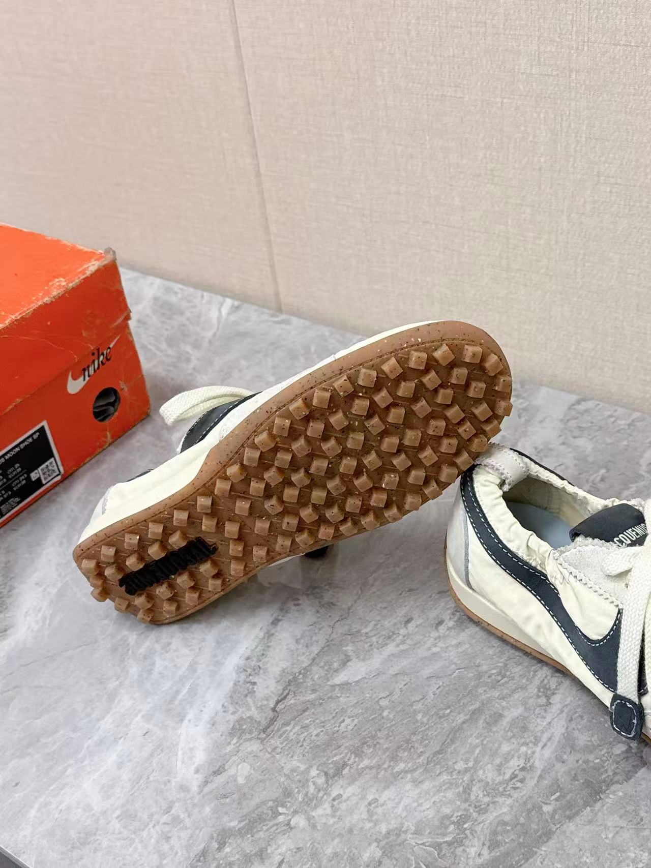 Nike x Jacquemus Moon Shoe SP in the Pale Yellow or Alabaster colorway