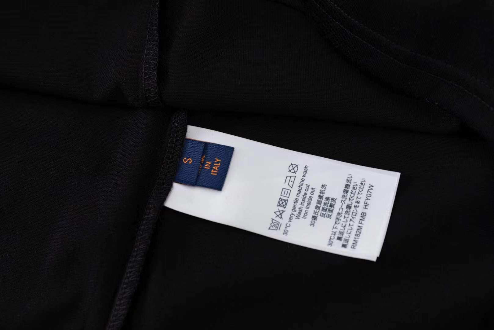 LV black short-sleeved t-shirt with a graphic of a cartoon tiger wearing sunglasses and holding a drink