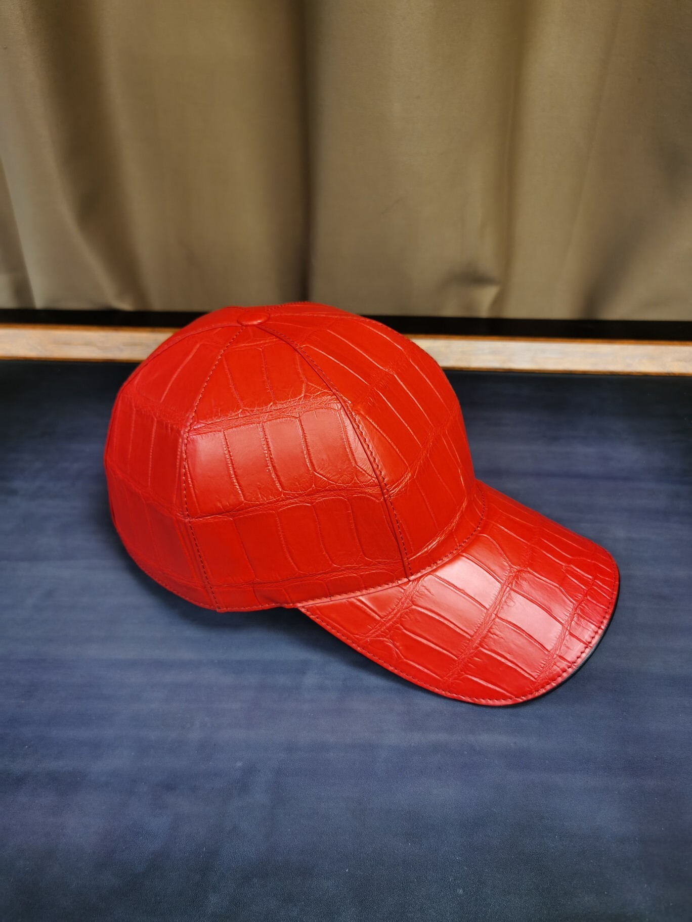 crocodile leather baseball cap in a light beige or sand color