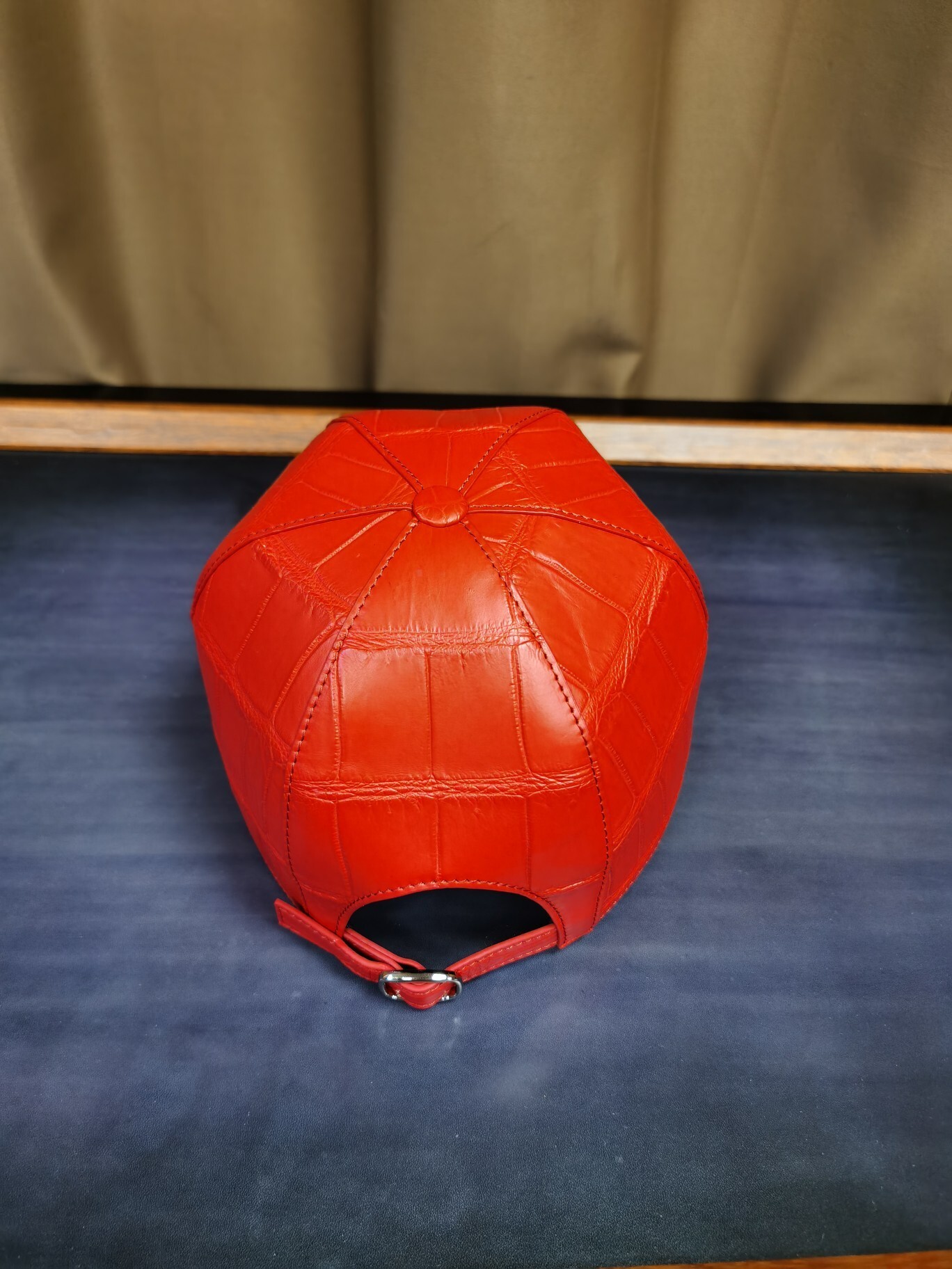 crocodile leather baseball cap in a light beige or sand color