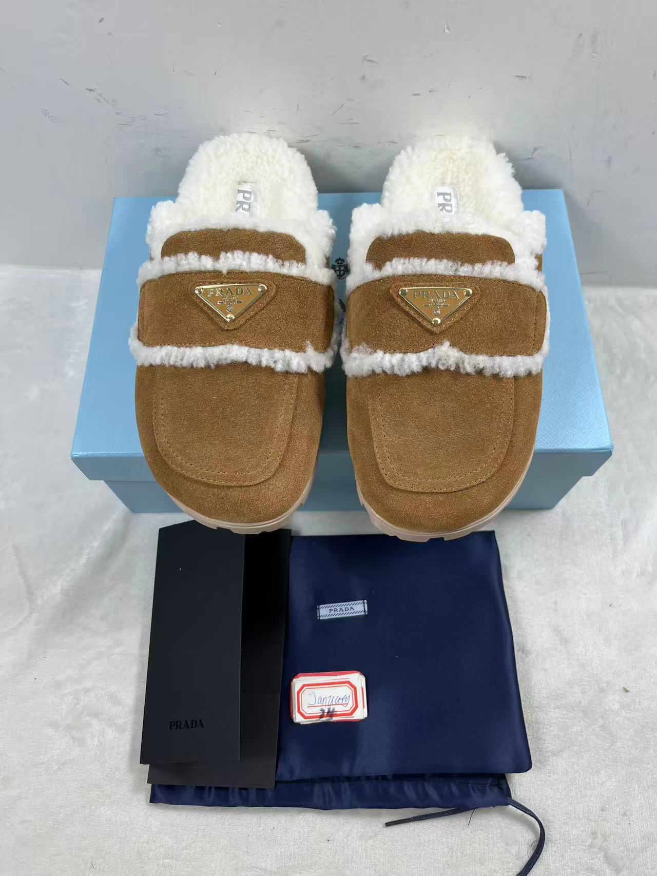 Prada Shearling Slippers in beige suede all colors