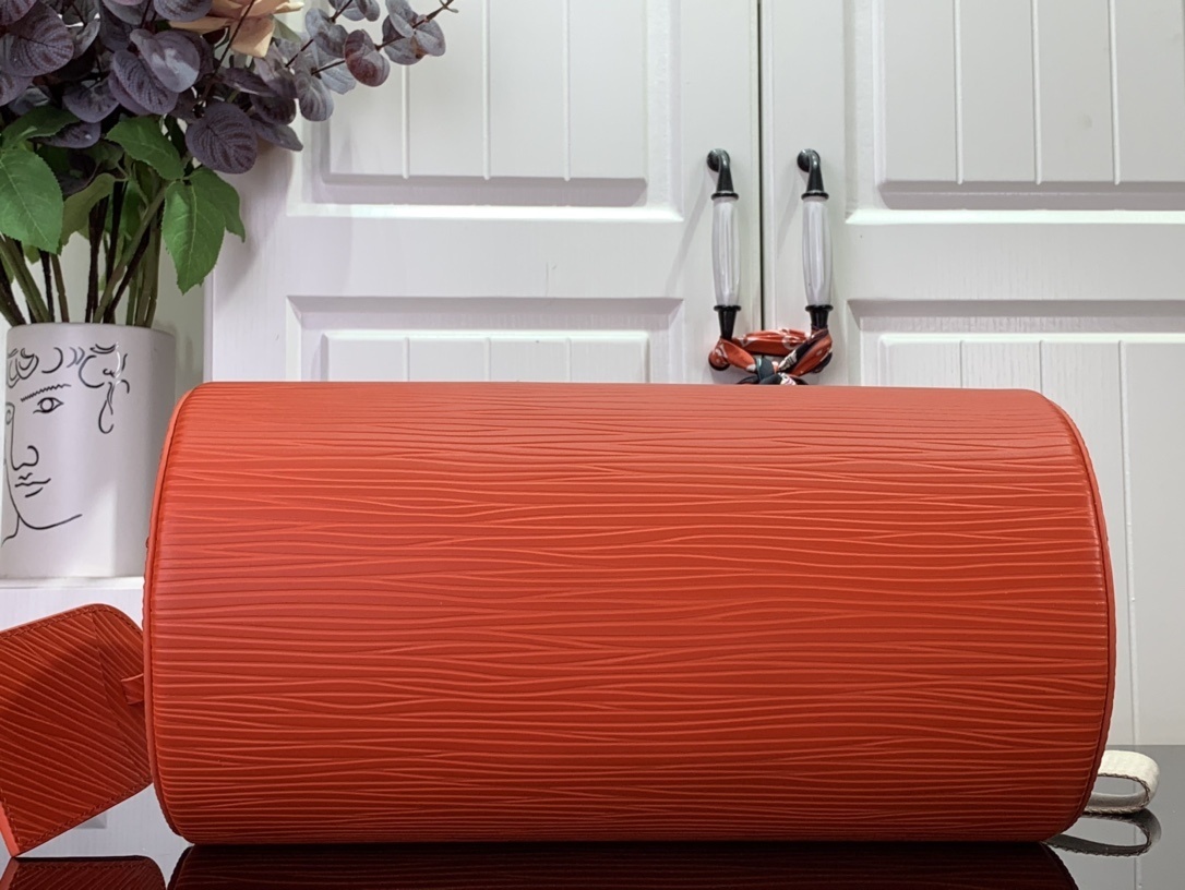 LV Epi XL Soft Polochon shoulder bag in rouge red calfskin leather