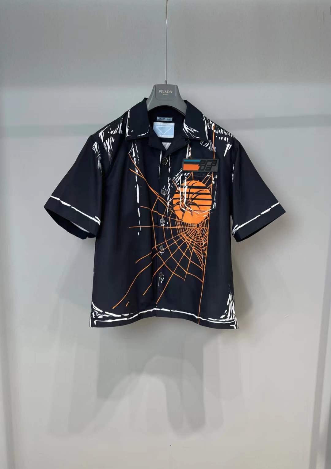 Prada Spiders and Webs graphic bowling shirt from their SS18 October Timecapsule collection