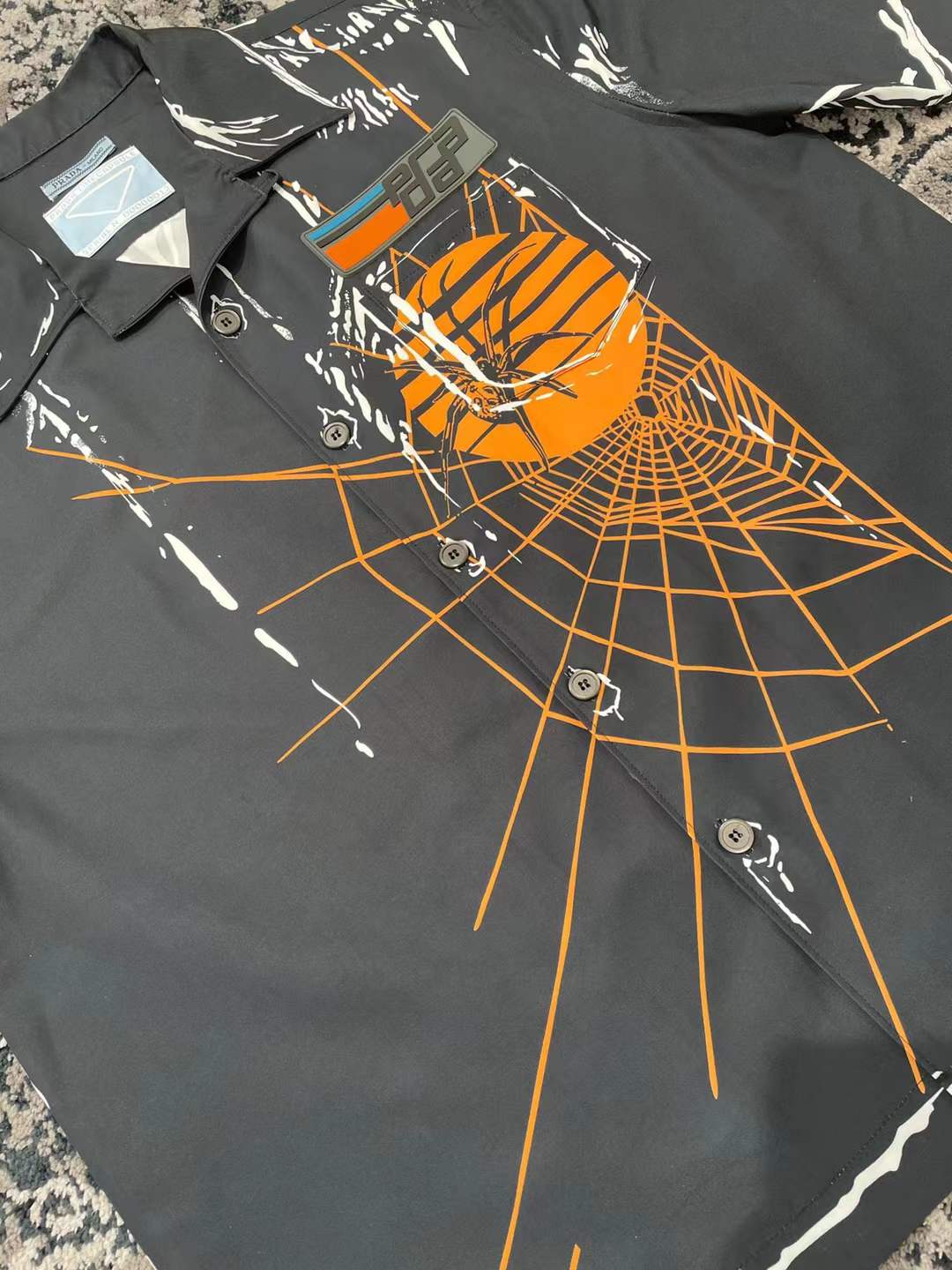 Prada Spiders and Webs graphic bowling shirt from their SS18 October Timecapsule collection