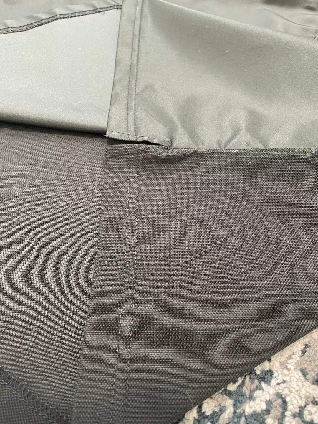 Prada men's stretch cotton polo shirt with a contrasting Re-Nylon breast pocket and the brand's iconic enameled metal triangle logo