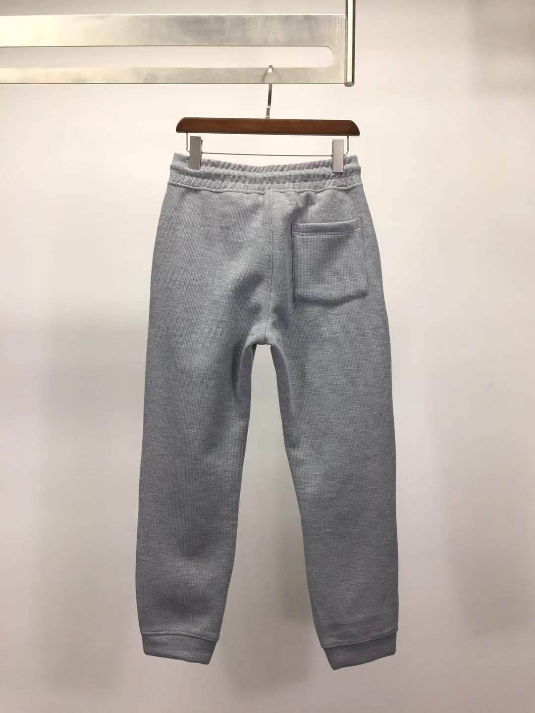 Moncler slim-fit tapered logo-embroidered loopback cotton-jersey sweatpants in grey.