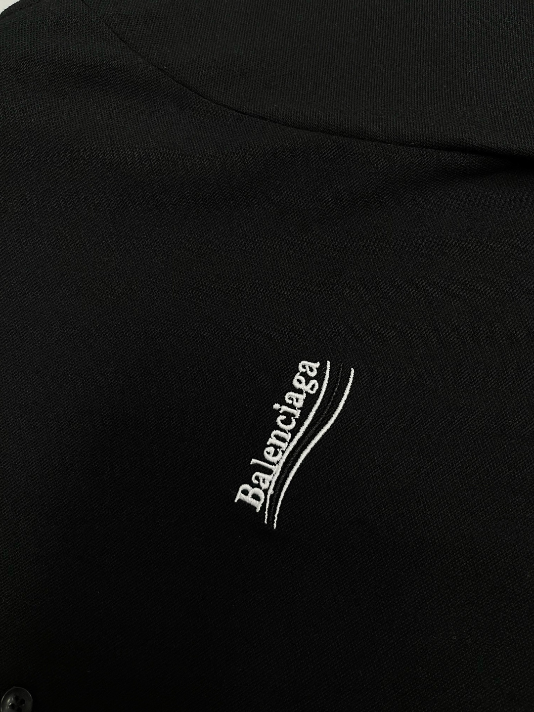 Balmain black short-sleeve polo shirt with a logo collar