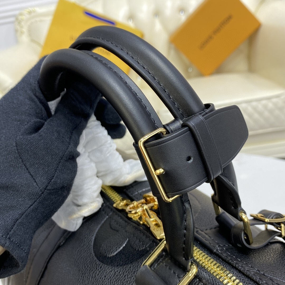 LV Keepall Bandoulière 45 duffle bag in black Monogram Empreinte leather