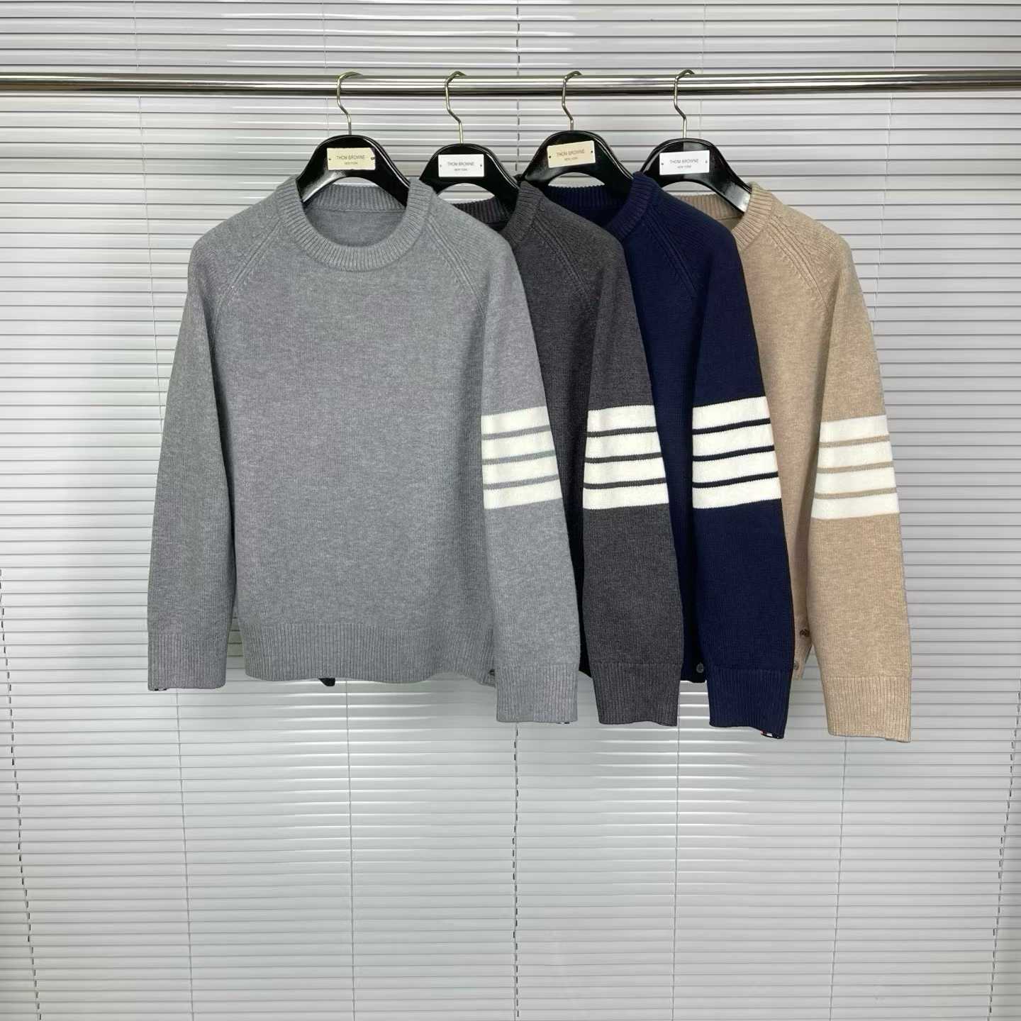Thom Browne 4-Bar crewneck sweater available in various colors like grey, charcoal, navy, and beige