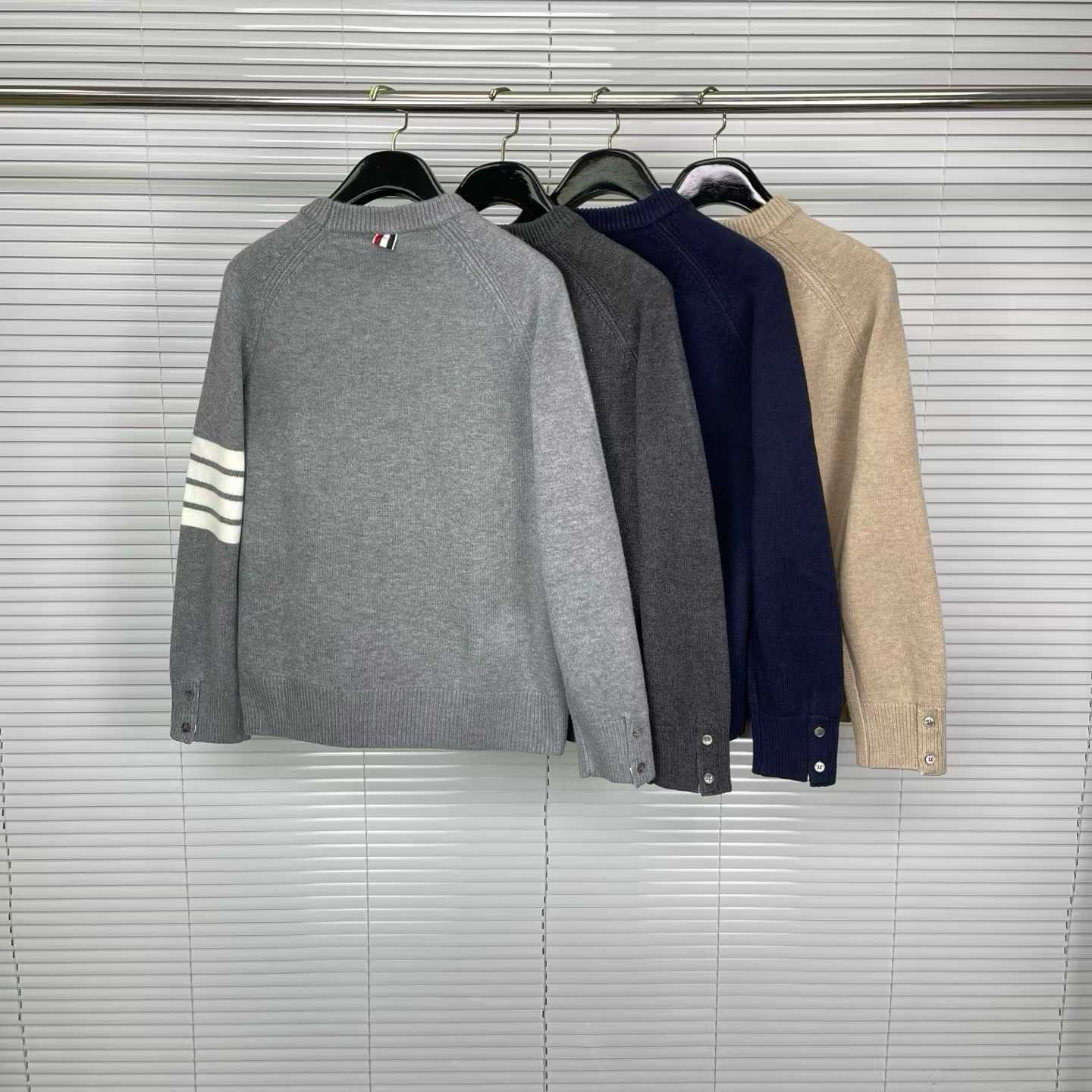 Thom Browne 4-Bar crewneck sweater available in various colors like grey, charcoal, navy, and beige