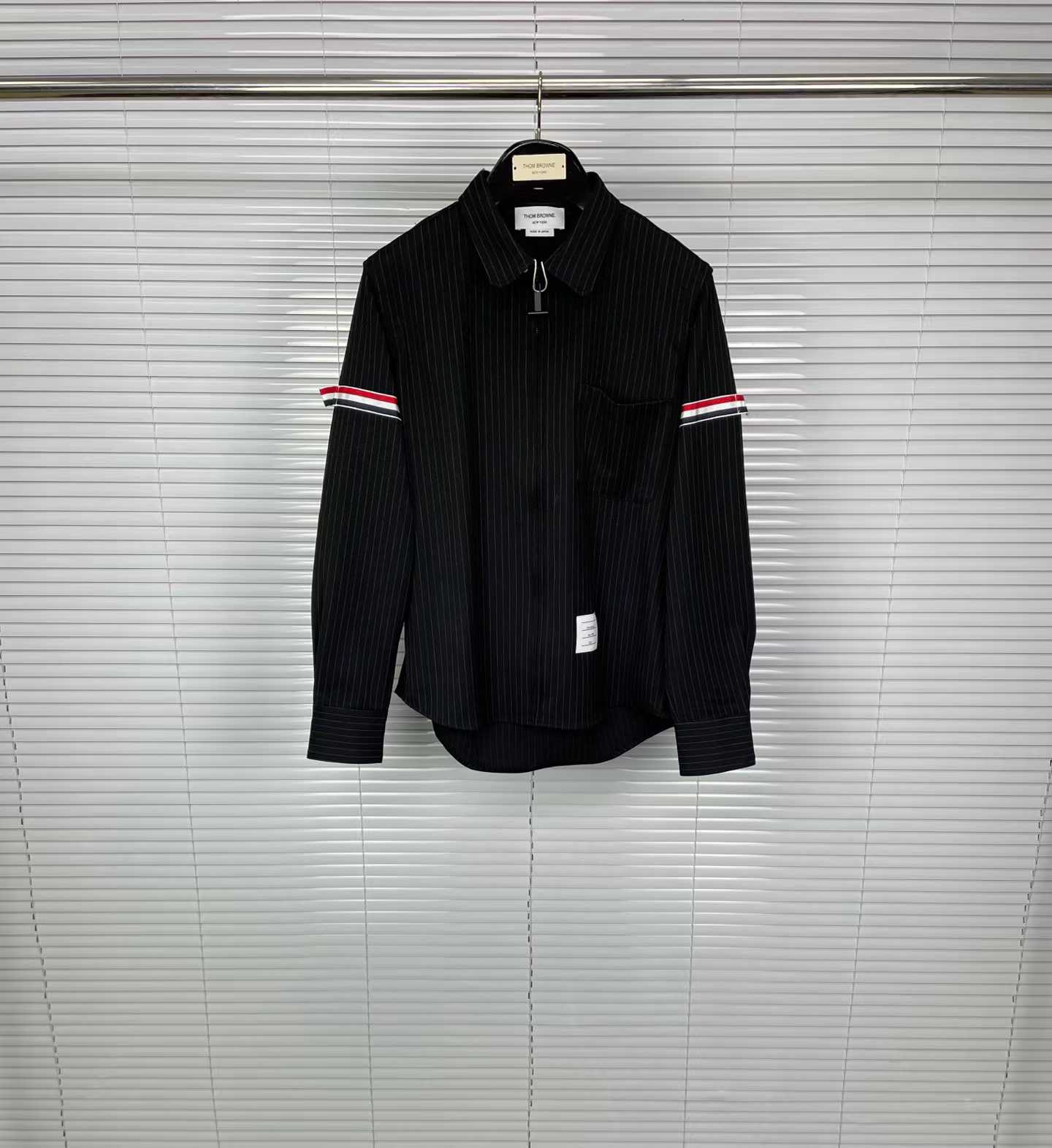 Thom Browne Pinstripe High Twist Wool Zip-Up Shirt featuring signature grosgrain armbands and a front zipper