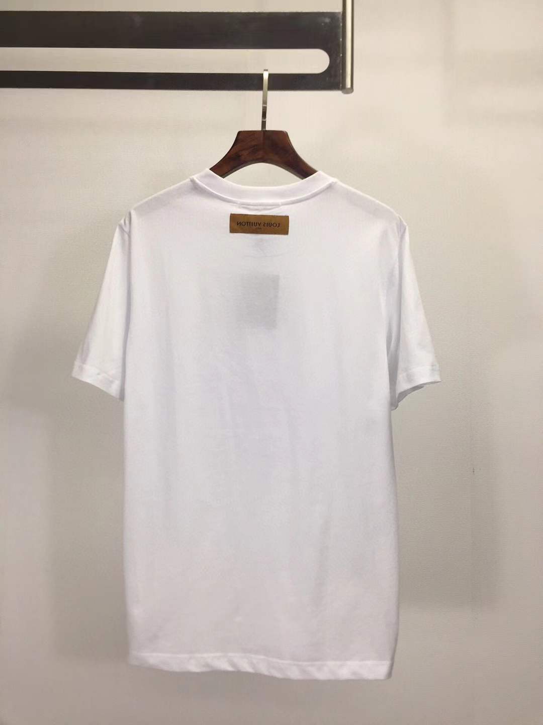 LV T-shirt featuring a blue graphic print that includes the brand name, "1854", and "PARIS. FRANCE".