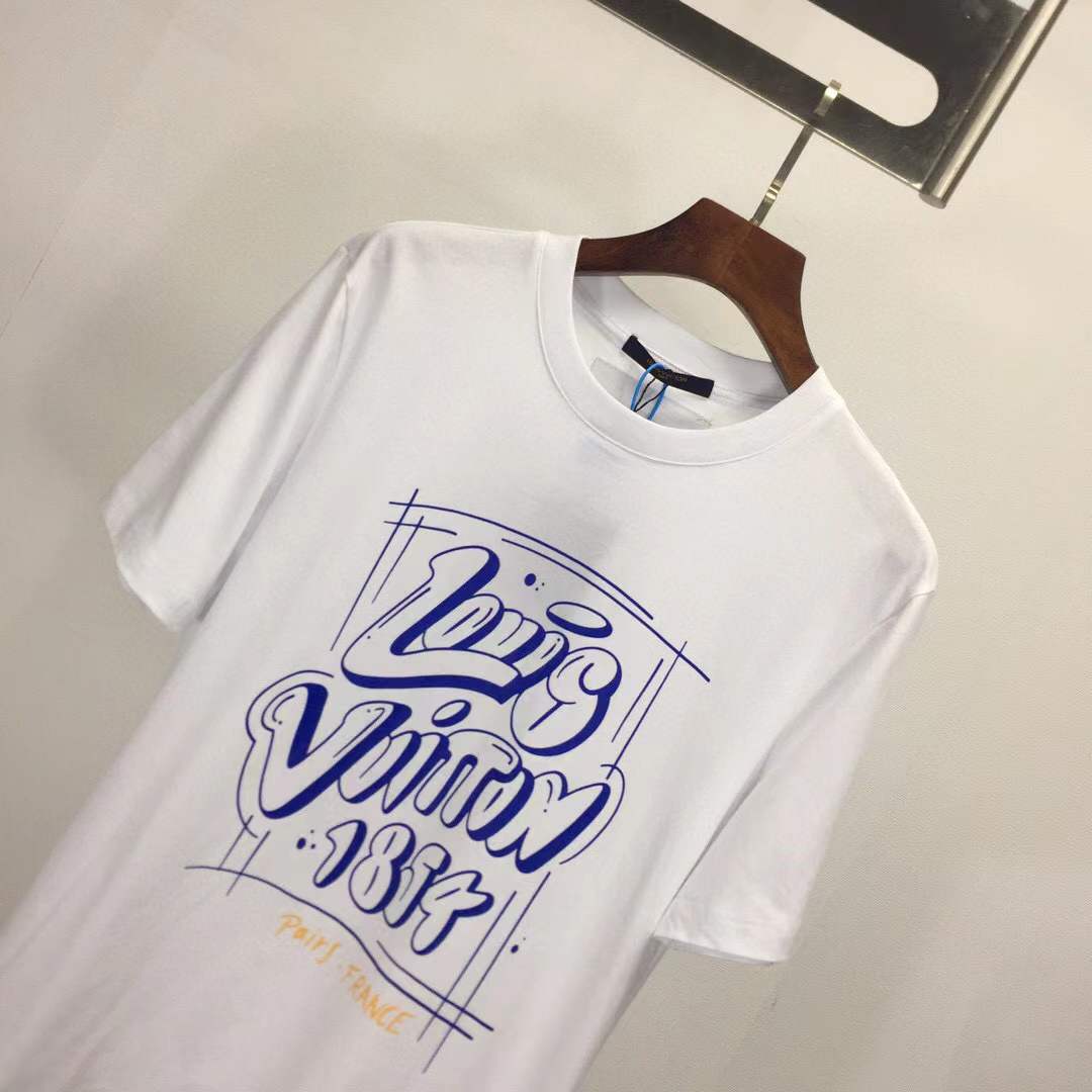 LV T-shirt featuring a blue graphic print that includes the brand name, "1854", and "PARIS. FRANCE".