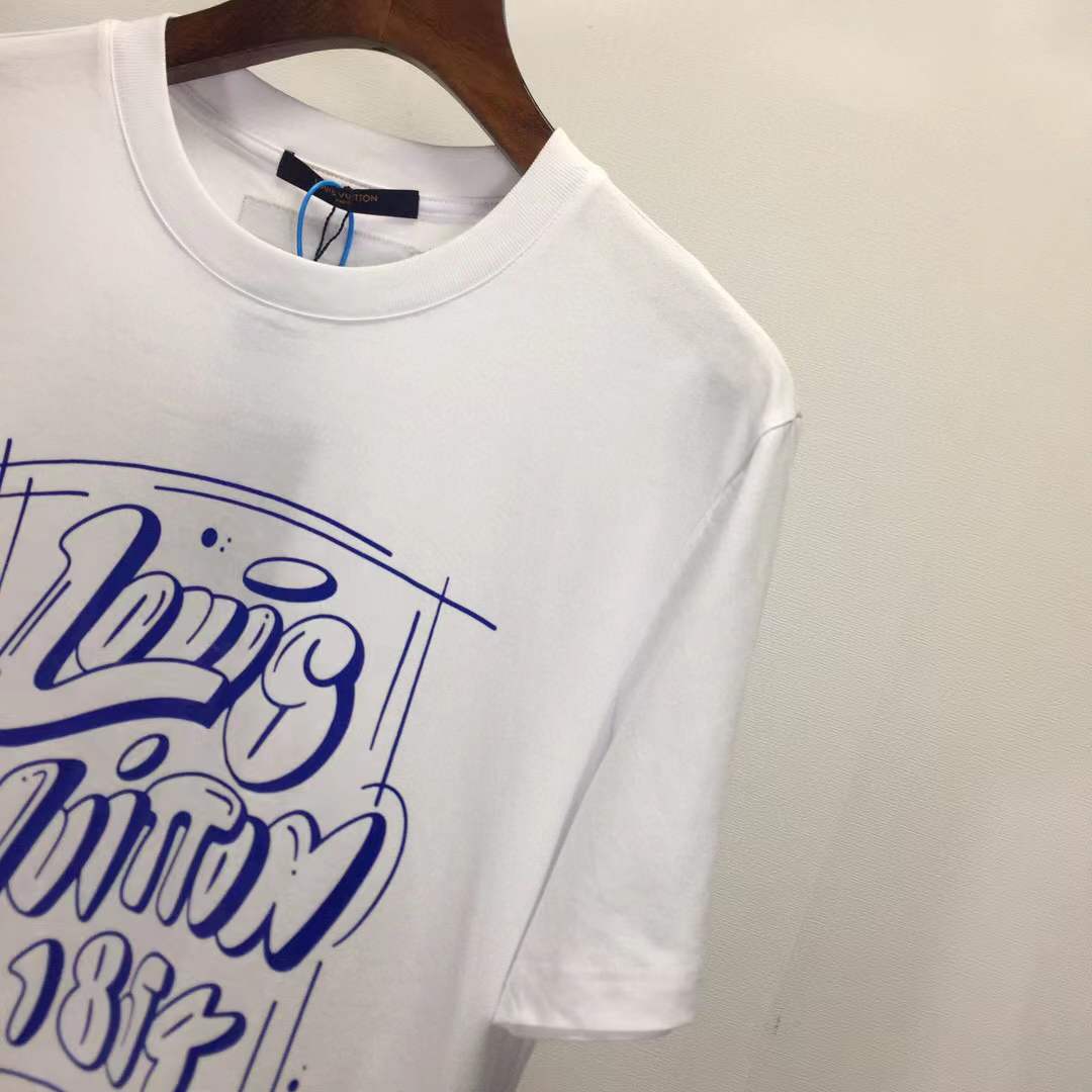LV T-shirt featuring a blue graphic print that includes the brand name, "1854", and "PARIS. FRANCE".
