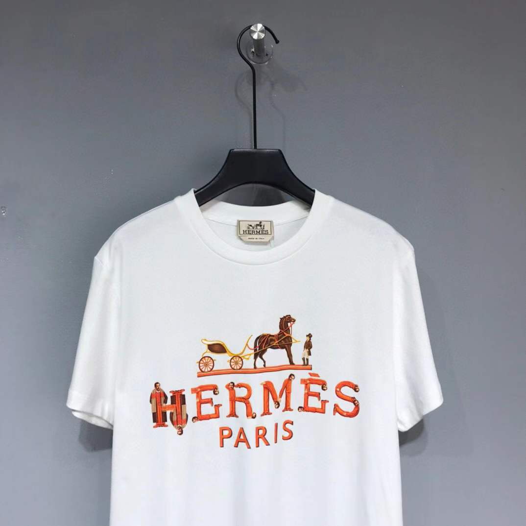 Hermes Paris t-shirt with an orange and yellow logo graphic.