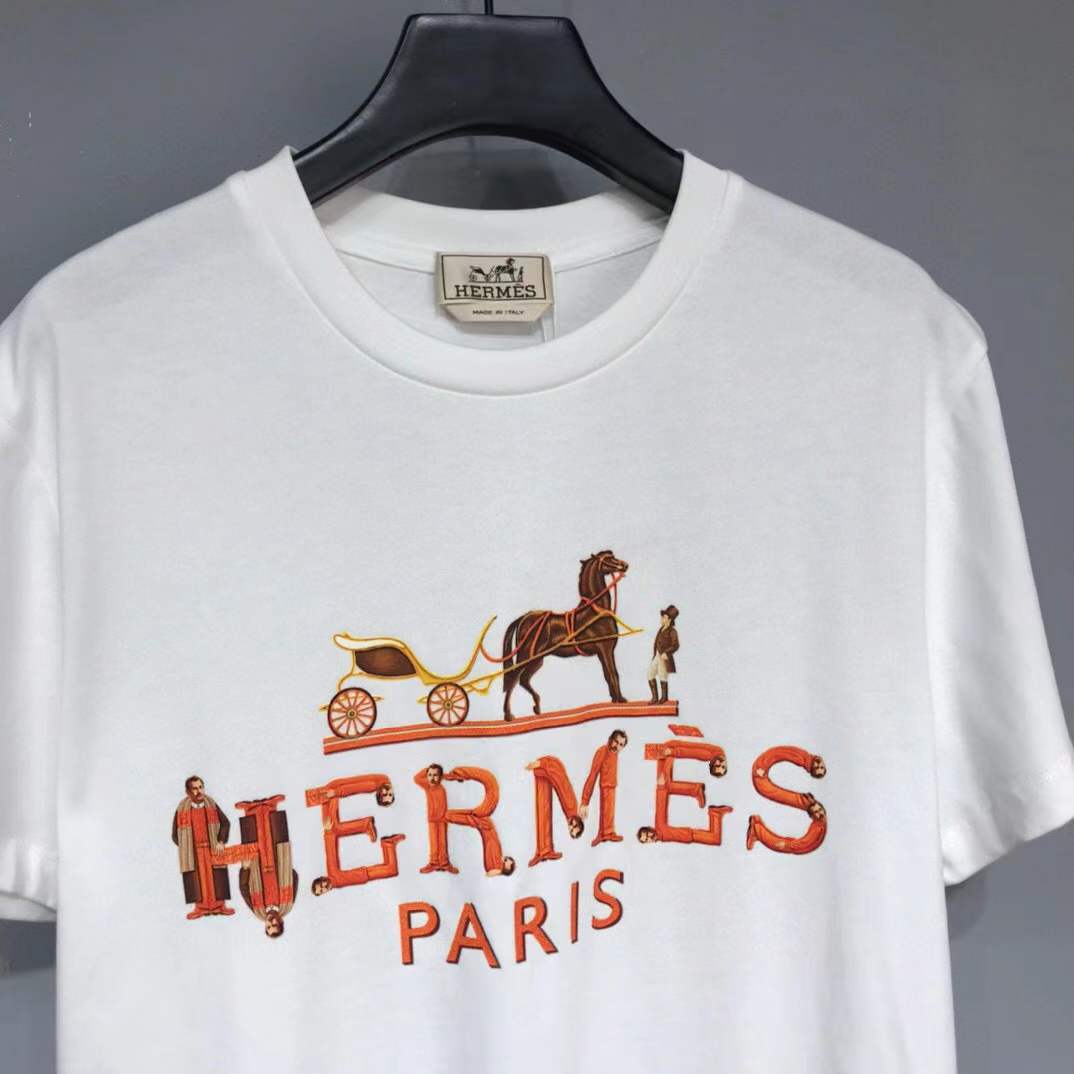 Hermes Paris t-shirt with an orange and yellow logo graphic.