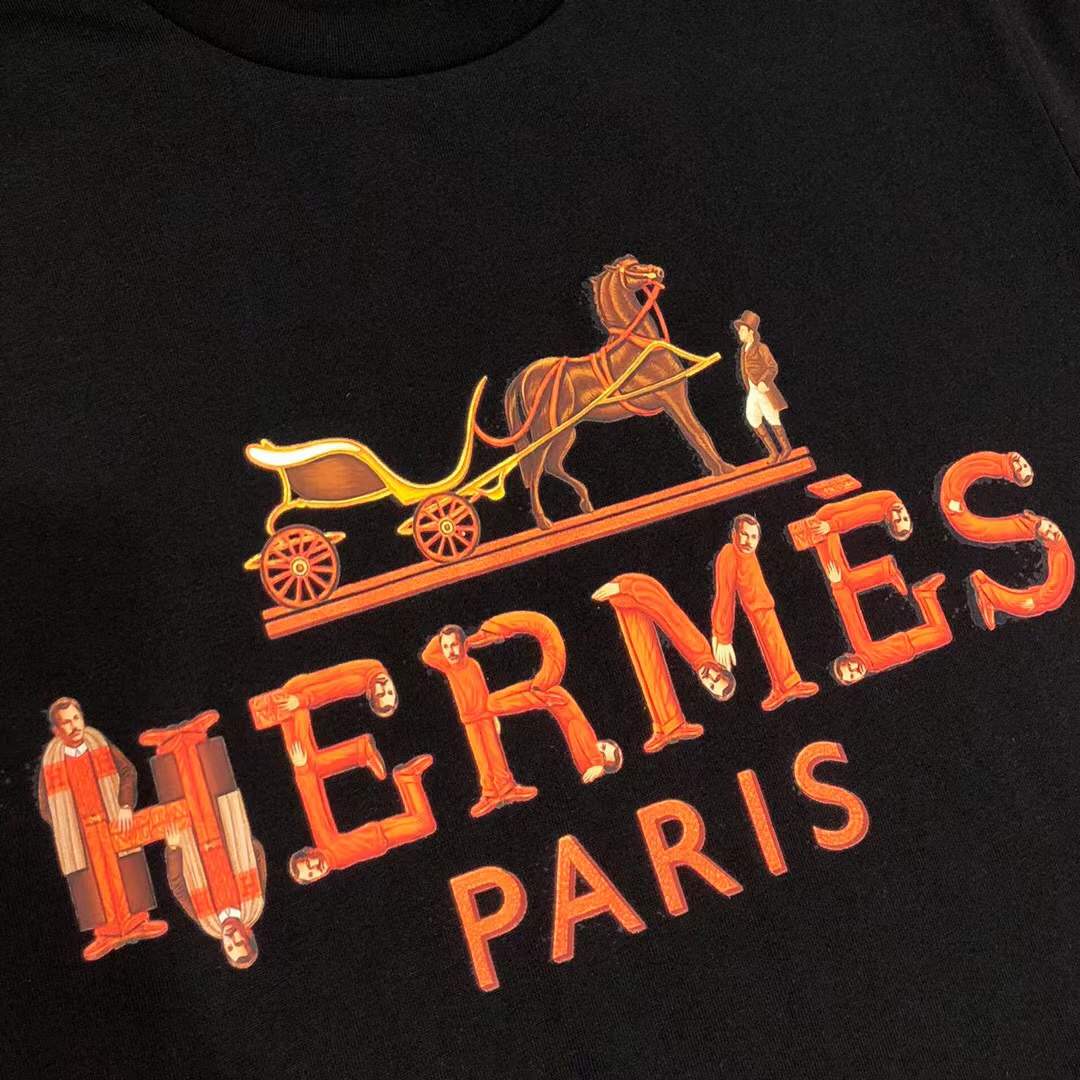 Hermes Paris t-shirt with an orange and yellow logo graphic.