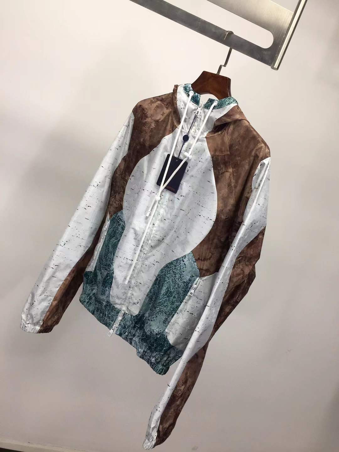 LV Monogram Marble Windbreaker in blue and brown.