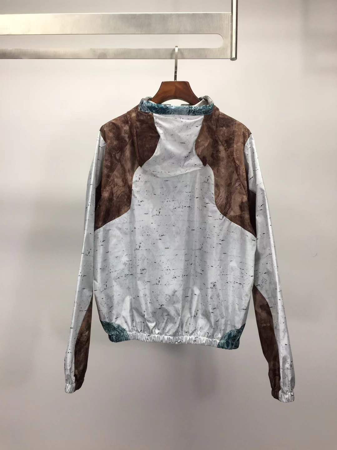 LV Monogram Marble Windbreaker in blue and brown.