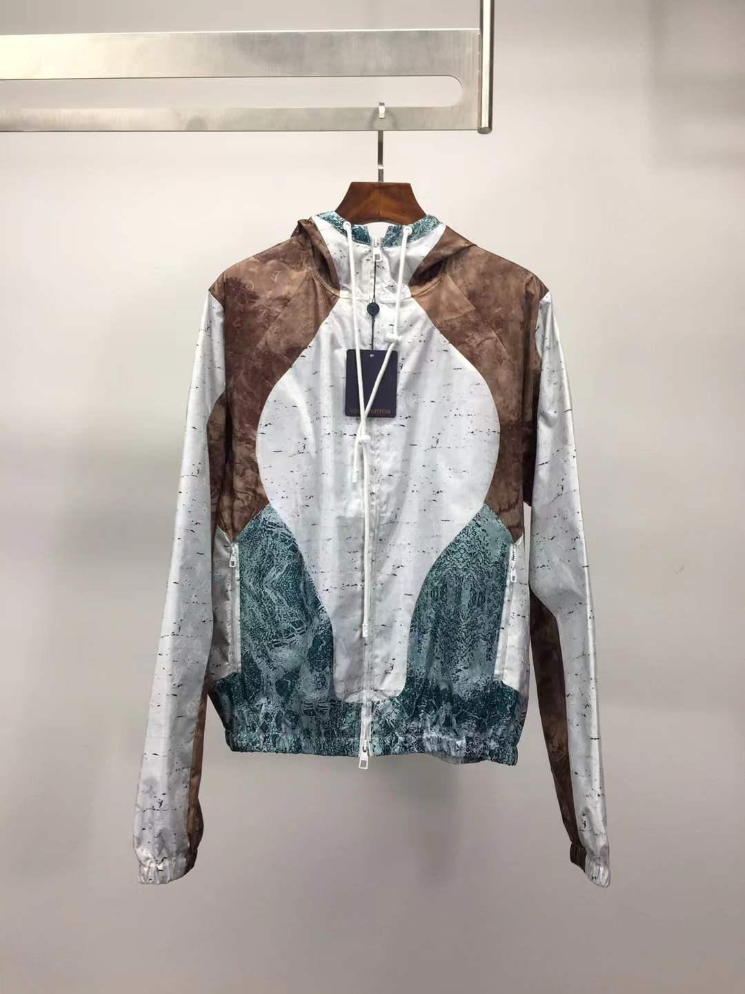 LV Monogram Marble Windbreaker in blue and brown.