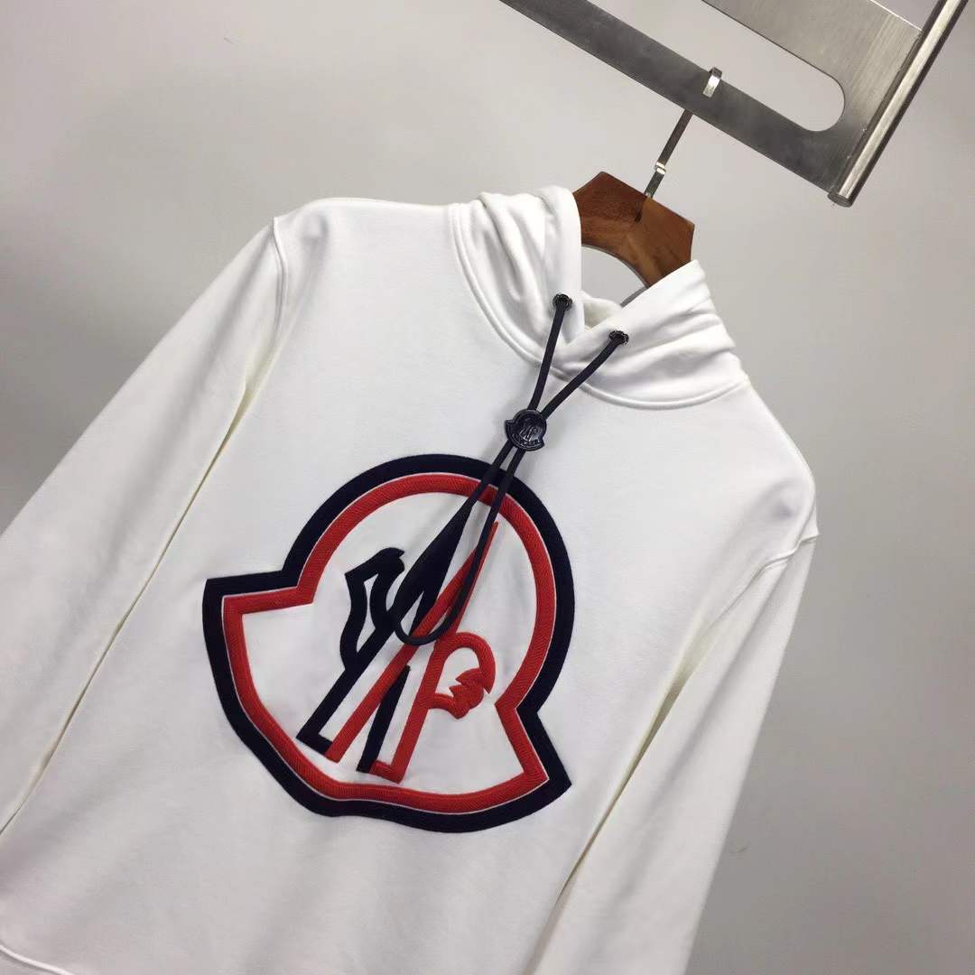 Moncler cotton hoodie with a large, two-tone embroidered logo on the front
