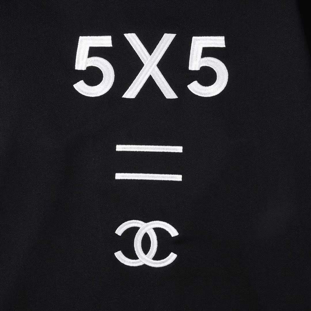 Chanel crewneck sweatshirt with the logo and "PARIS" text on the chest, and the number "5" on the sleeve