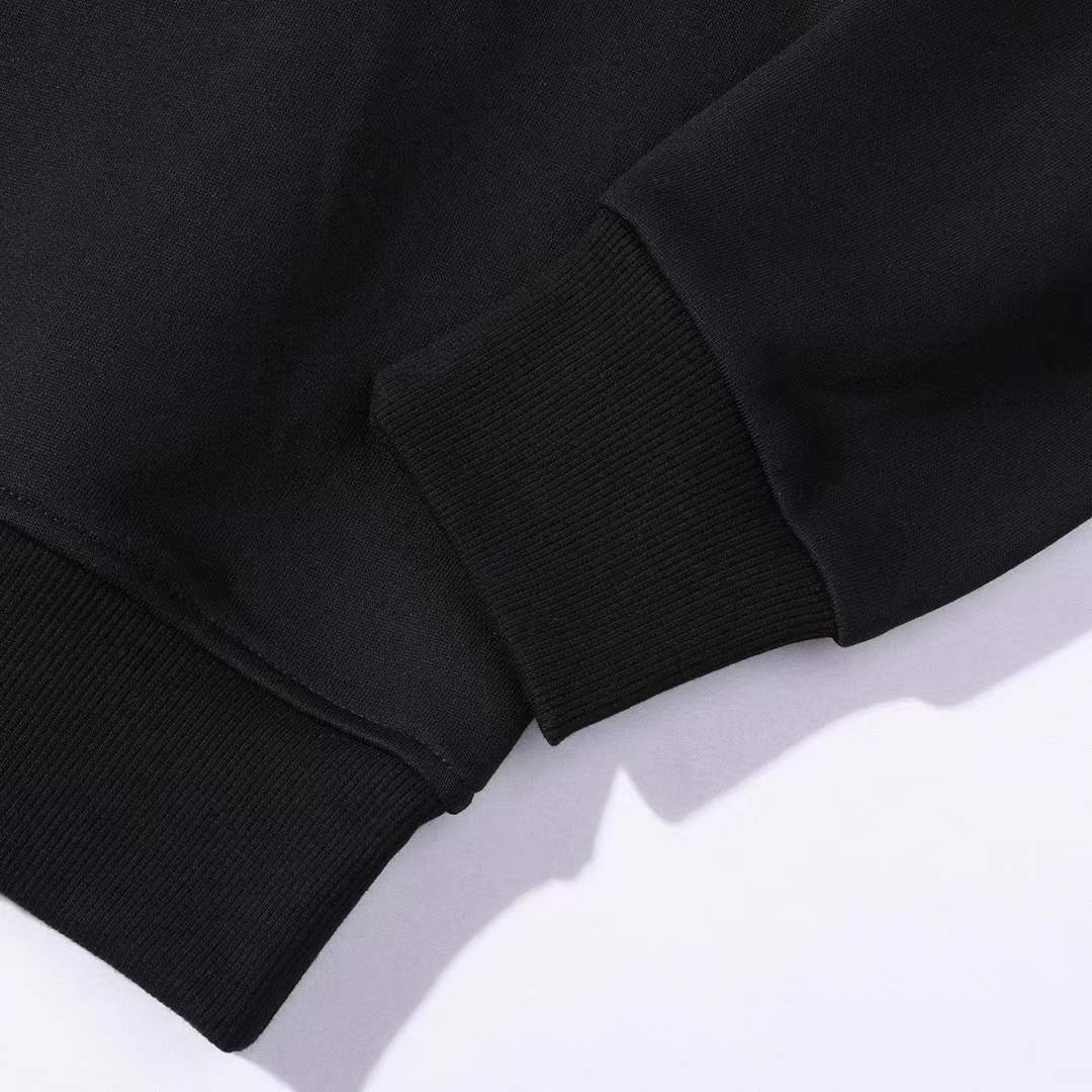 Chanel crewneck sweatshirt with the logo and "PARIS" text on the chest, and the number "5" on the sleeve