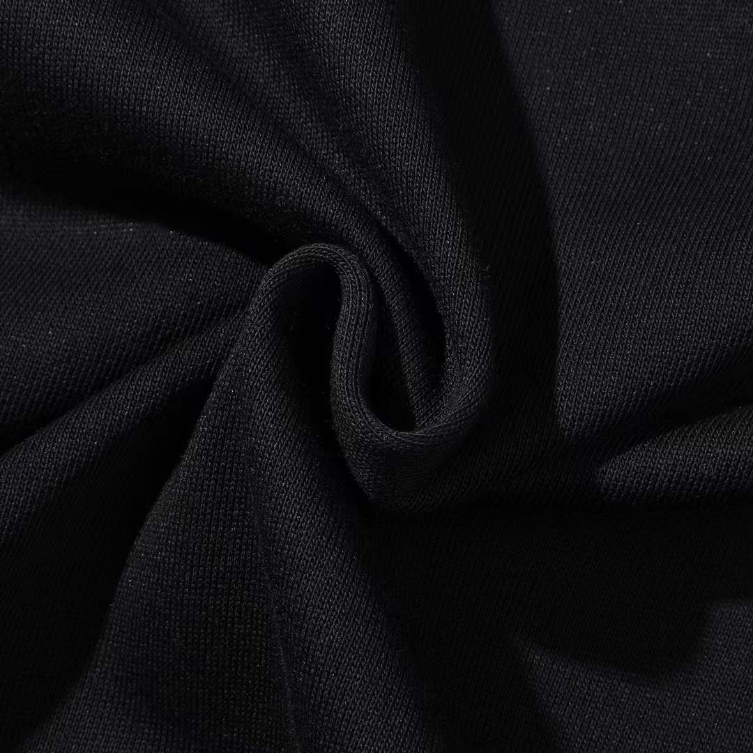 Chanel crewneck sweatshirt with the logo and "PARIS" text on the chest, and the number "5" on the sleeve