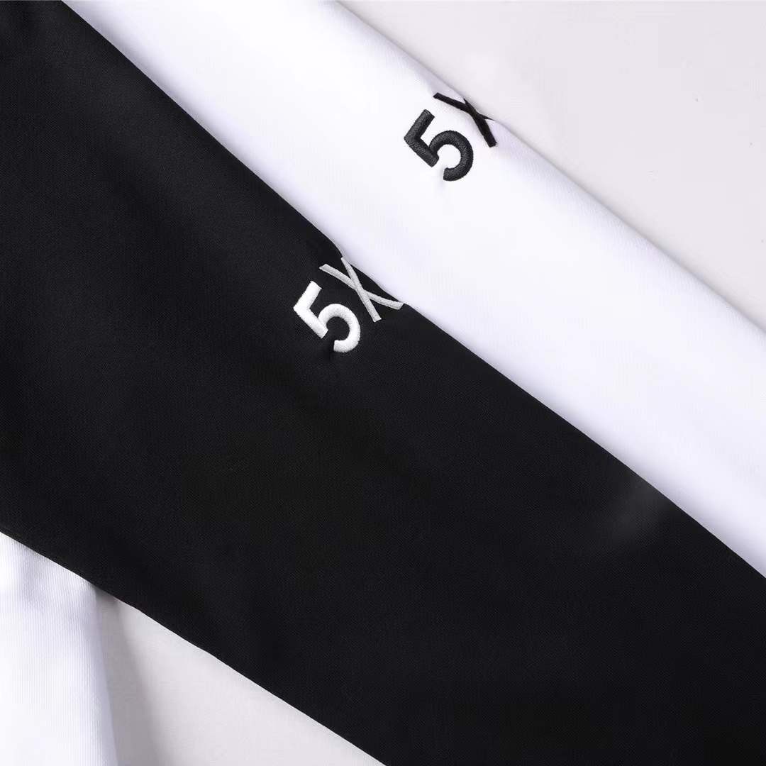 Chanel crewneck sweatshirt with the logo and "PARIS" text on the chest, and the number "5" on the sleeve