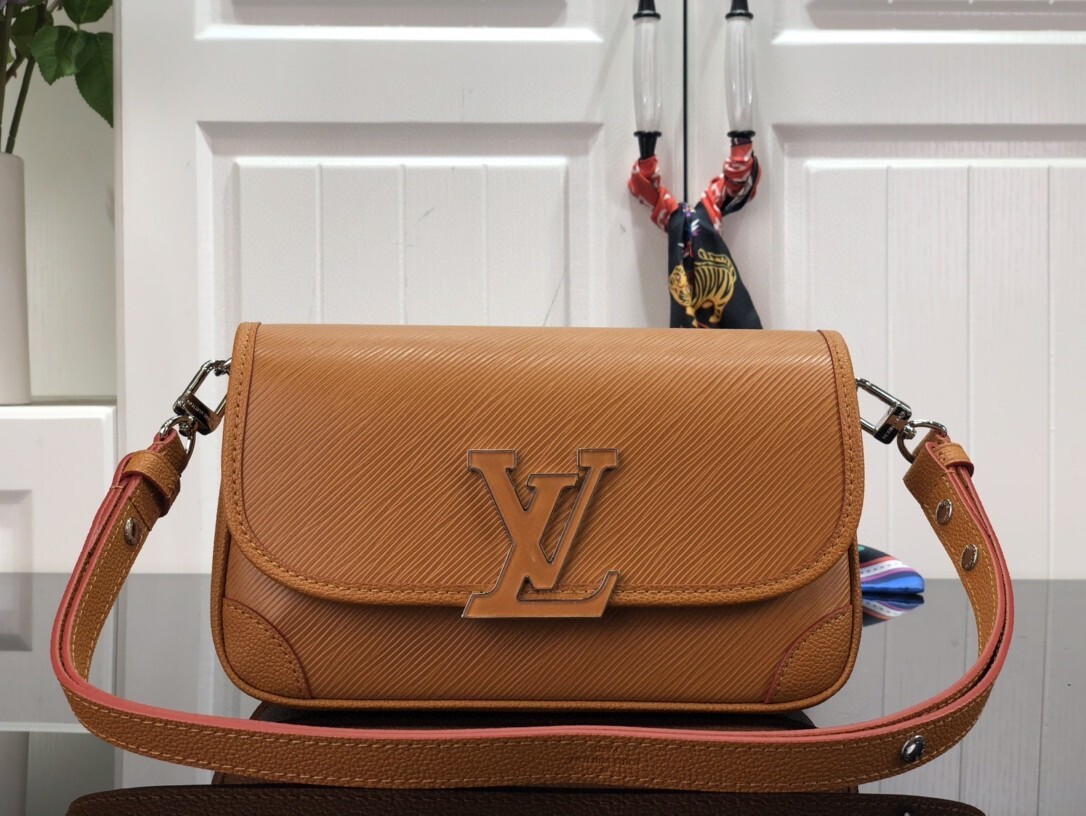 LV Buci bag crafted from textured Epi leather in a golden honey brown color