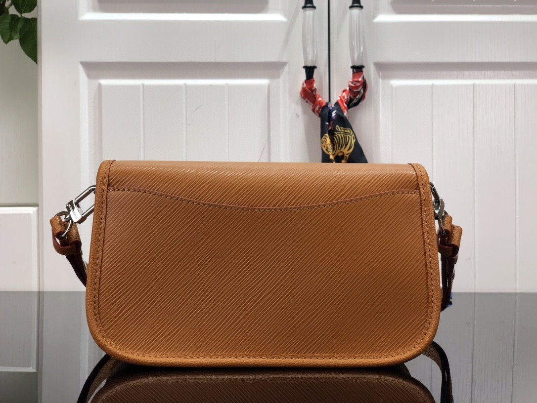 LV Buci bag crafted from textured Epi leather in a golden honey brown color