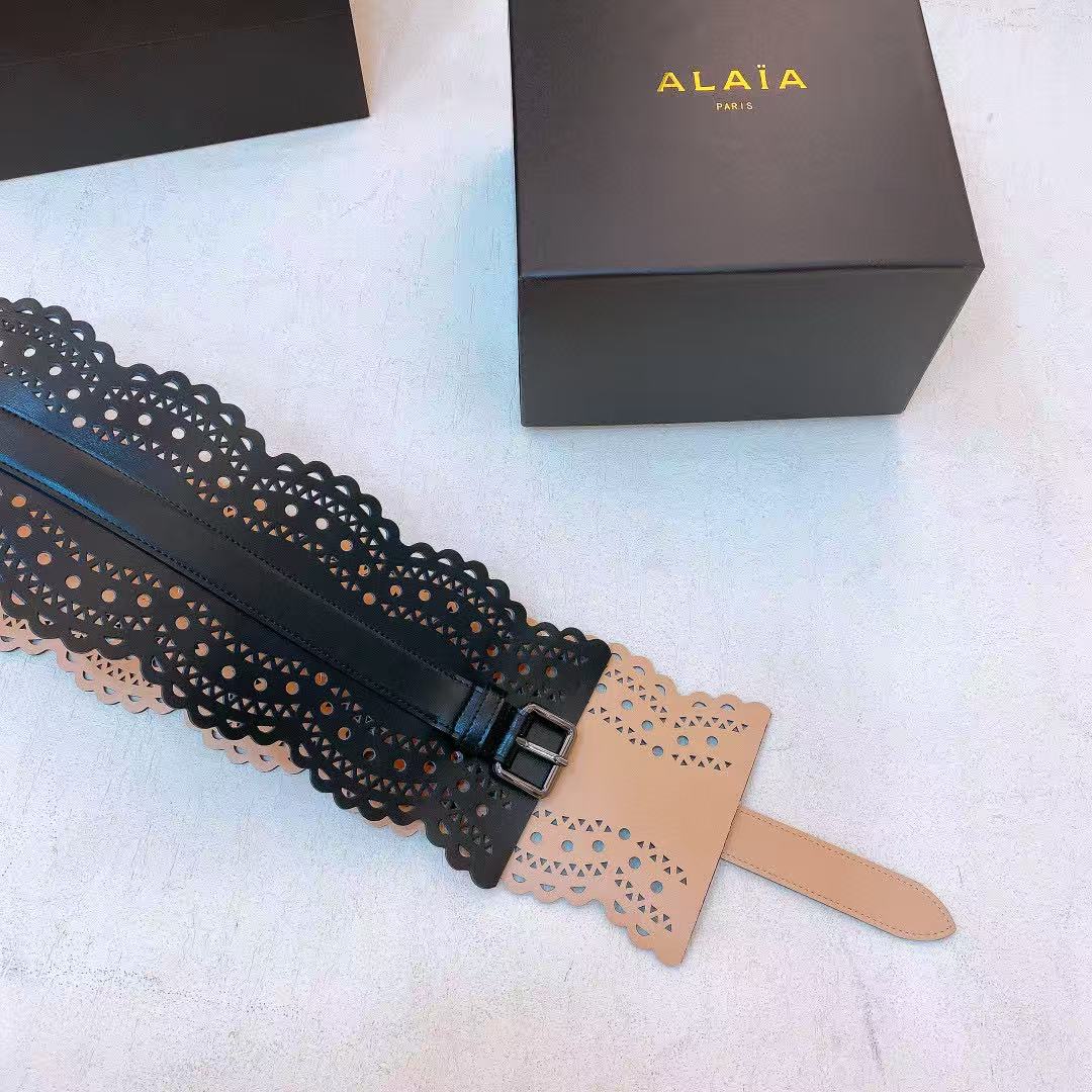 Alaïa black leather laser-cut waist belt.