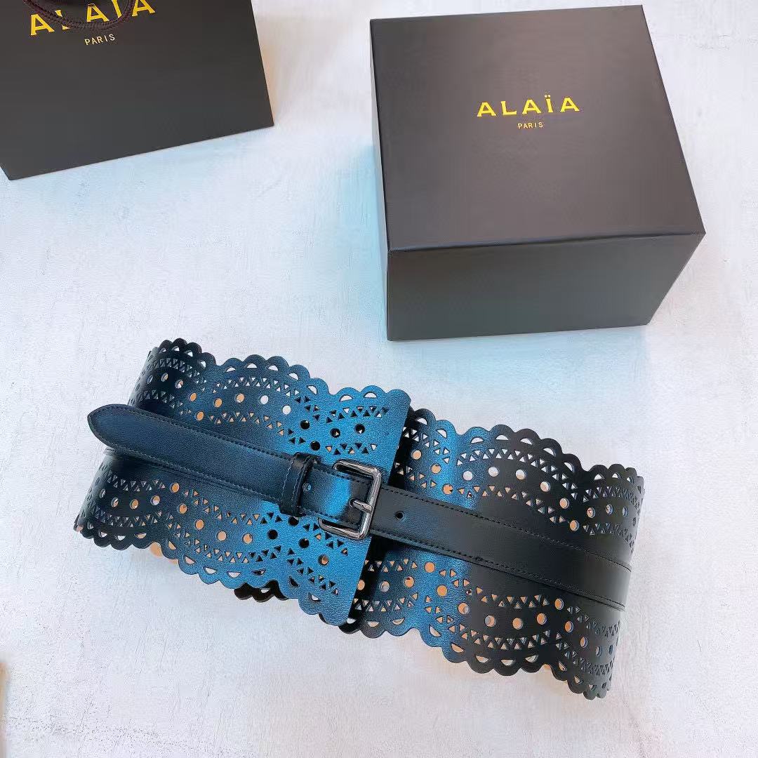 Alaïa black leather laser-cut waist belt.