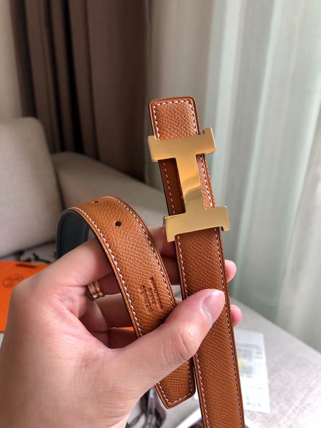 Hermès Focus H buckle and reversible leather strap belt 2.4mm in black and tawny brown leather with a rose gold-plated