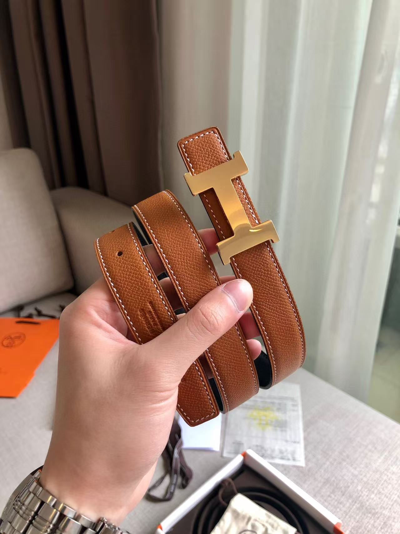 Hermès Focus H buckle and reversible leather strap belt 2.4mm in black and tawny brown leather with a rose gold-plated
