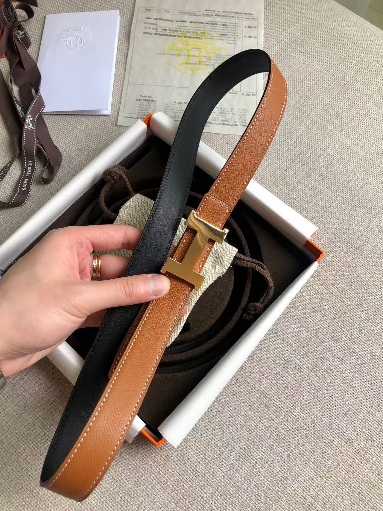 Hermès Focus H buckle and reversible leather strap belt 2.4mm in black and tawny brown leather with a rose gold-plated