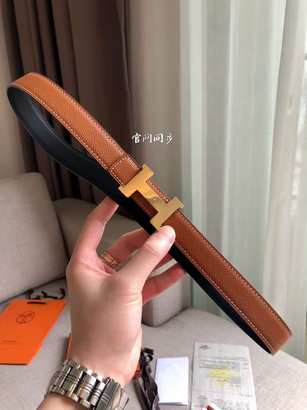 Hermès Focus H buckle and reversible leather strap belt 2.4mm in black and tawny brown leather with a rose gold-plated