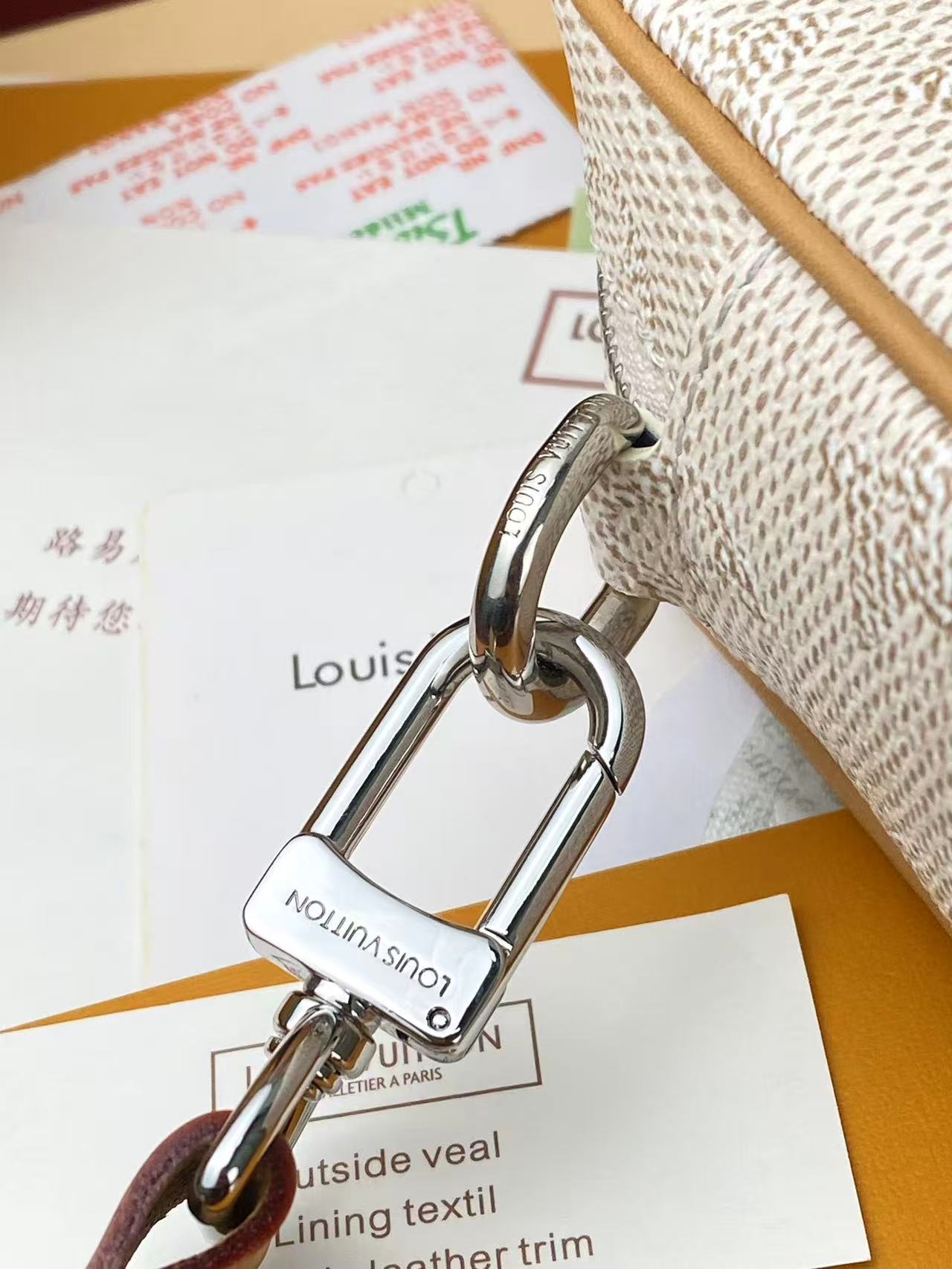 LV Trocadéro Wearable Wallet in Monogram Heritage coated canvas with natural cowhide-leather trim