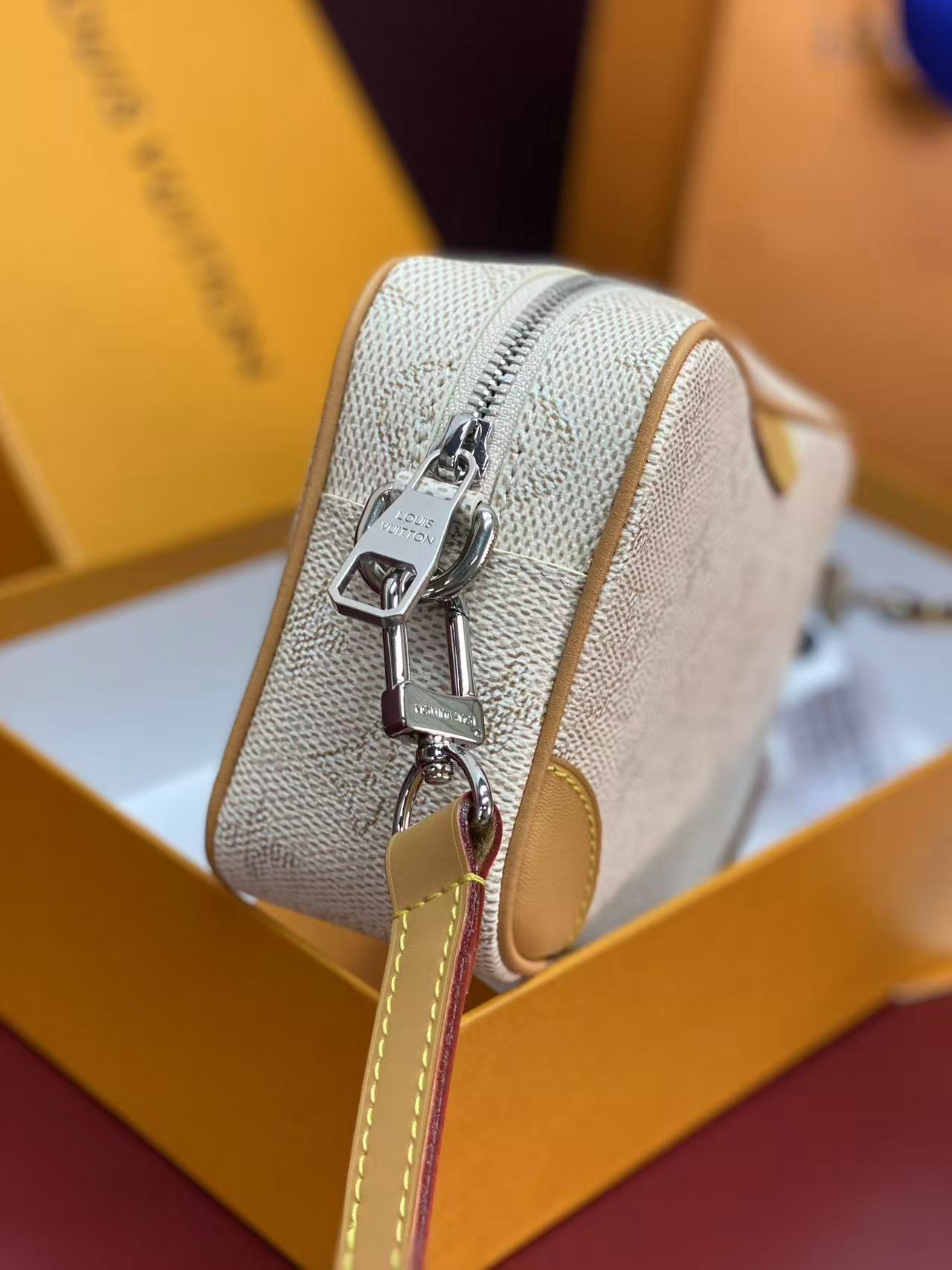 LV Trocadéro Wearable Wallet in Monogram Heritage coated canvas with natural cowhide-leather trim