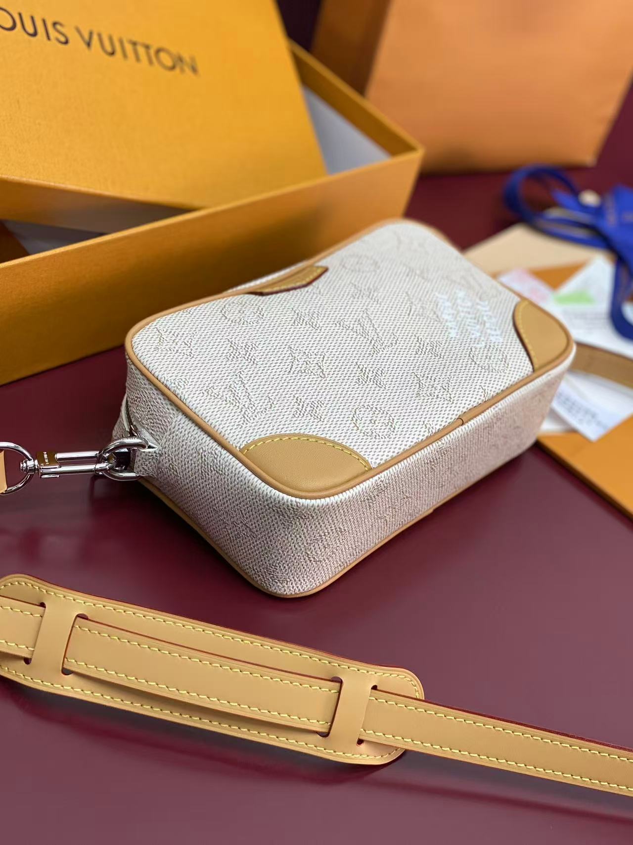 LV Trocadéro Wearable Wallet in Monogram Heritage coated canvas with natural cowhide-leather trim