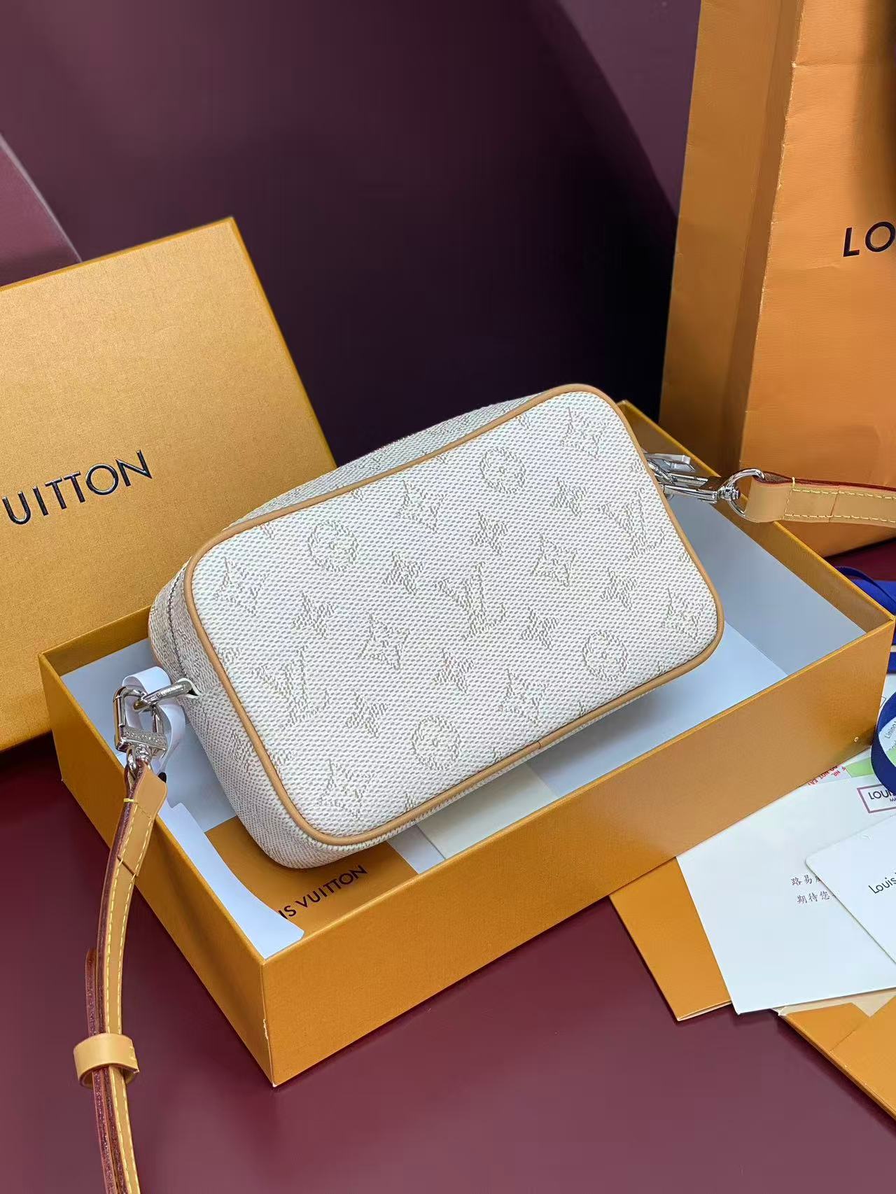 LV Trocadéro Wearable Wallet in Monogram Heritage coated canvas with natural cowhide-leather trim