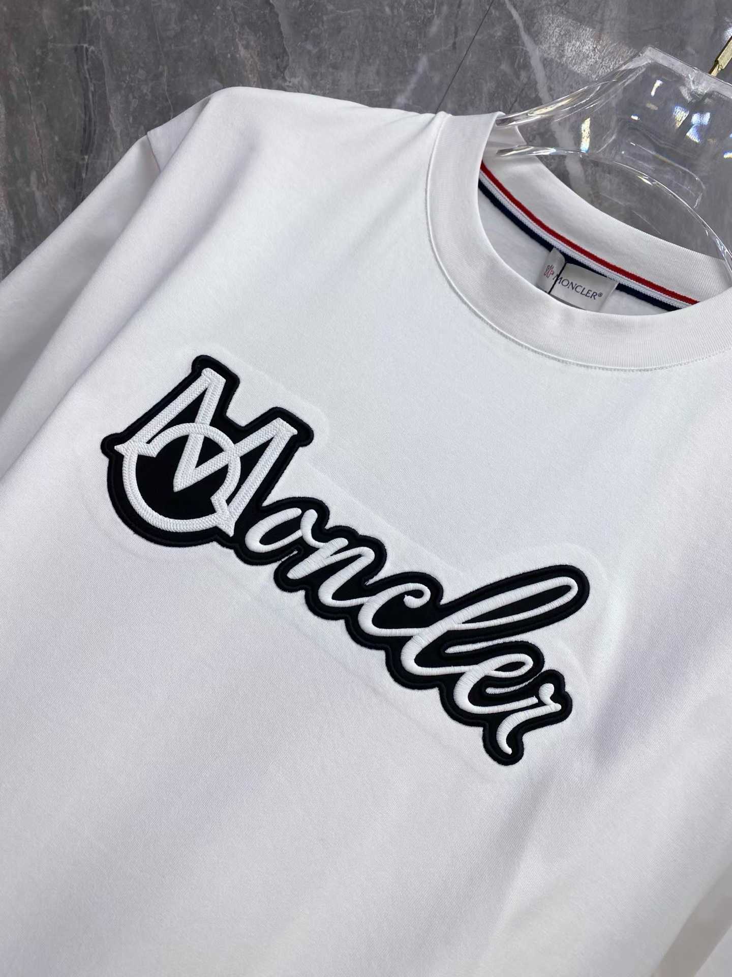Moncler Embroidered Varsity Logo Cotton T-shirt in white and black colorways