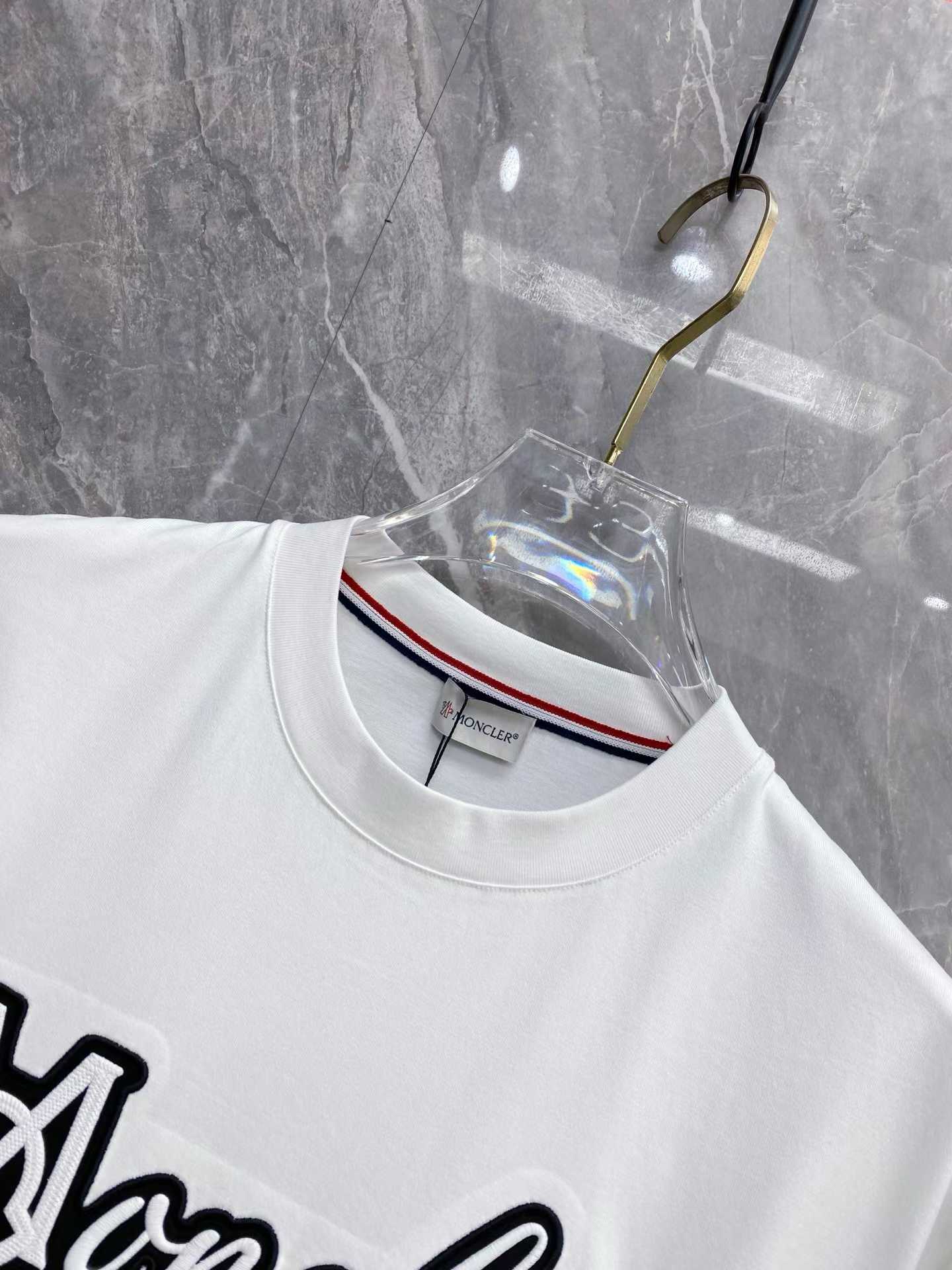 Moncler Embroidered Varsity Logo Cotton T-shirt in white and black colorways