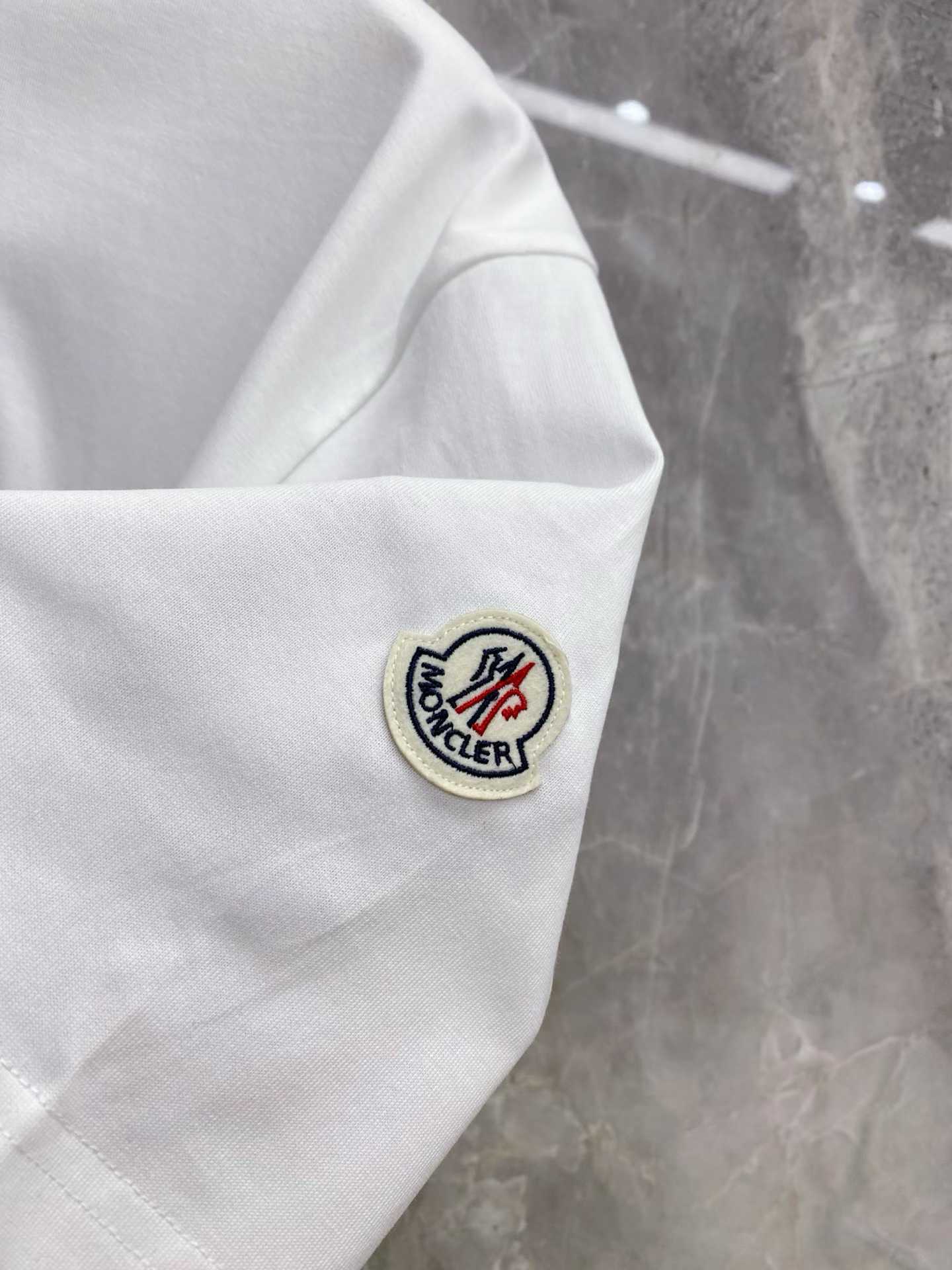Moncler Embroidered Varsity Logo Cotton T-shirt in white and black colorways