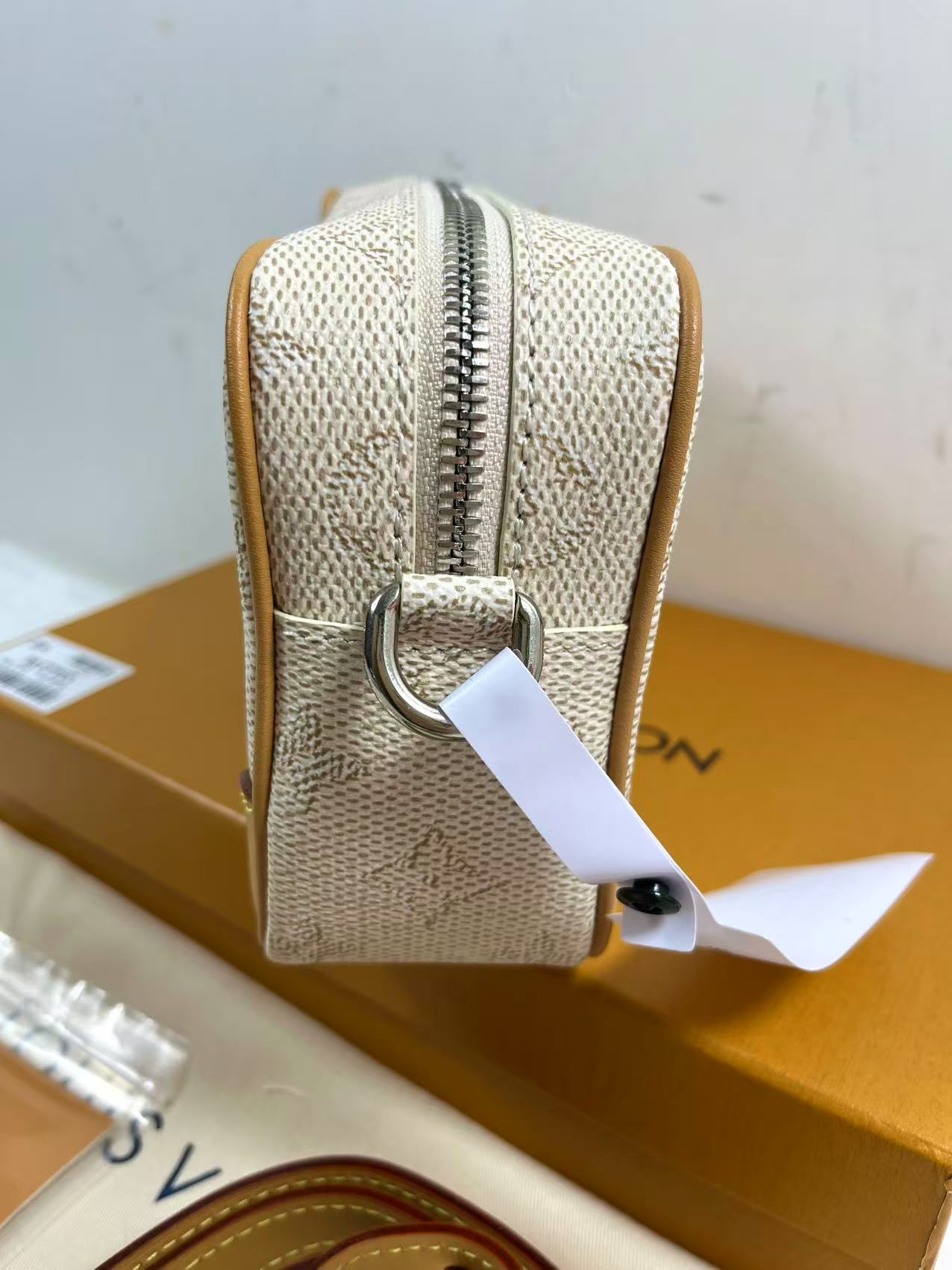 LV Trocadéro Wearable Wallet in Monogram Heritage coated canvas with natural cowhide-leather trim