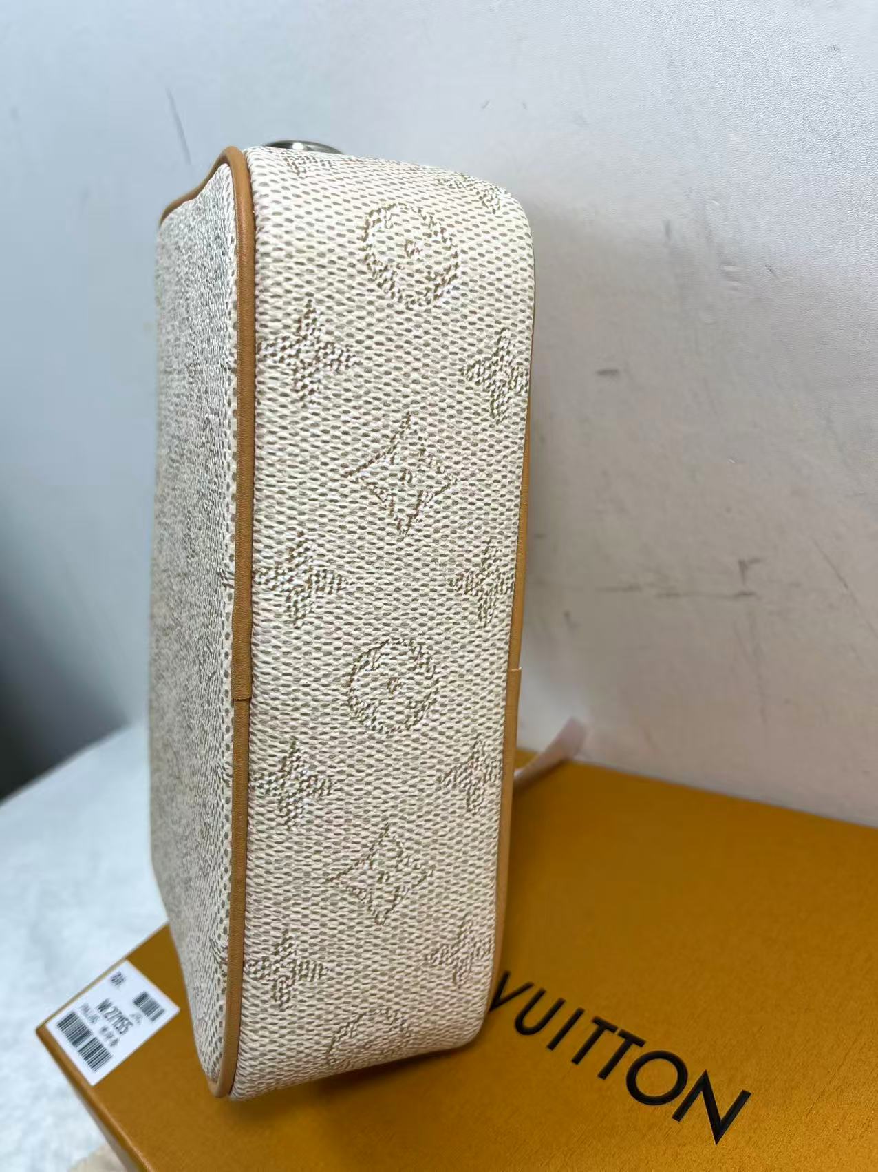 LV Trocadéro Wearable Wallet in Monogram Heritage coated canvas with natural cowhide-leather trim