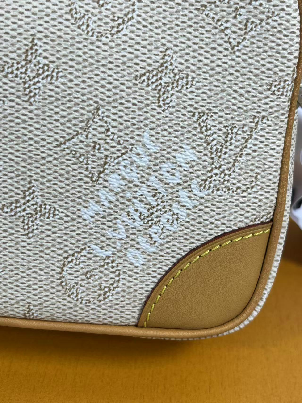 LV Trocadéro Wearable Wallet in Monogram Heritage coated canvas with natural cowhide-leather trim